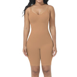 Tan bodysuit worn by a model on a white background