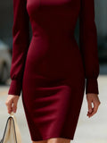 Maroon dress worn by a person with a blurred background