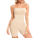 Beige strapless bodysuit worn by a model on a white background