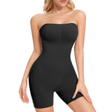 Black strapless bodysuit worn by a model on a white background
