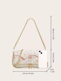 Floral handbag with chain strap and dimensions on a white background
