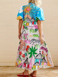Woman wearing a colorful dress with a pattern of palm trees, animals, and abstract shapes.