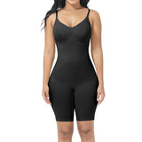 Black shapewear bodysuit worn by a model on a white background
