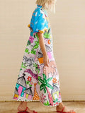 Colorful dress with abstract patterns worn by a person on a neutral background