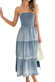 Woman wearing a strapless denim dress with a white background