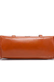 Brown leather clutch bag on a white background