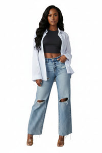 Light blue jeans on a beige background